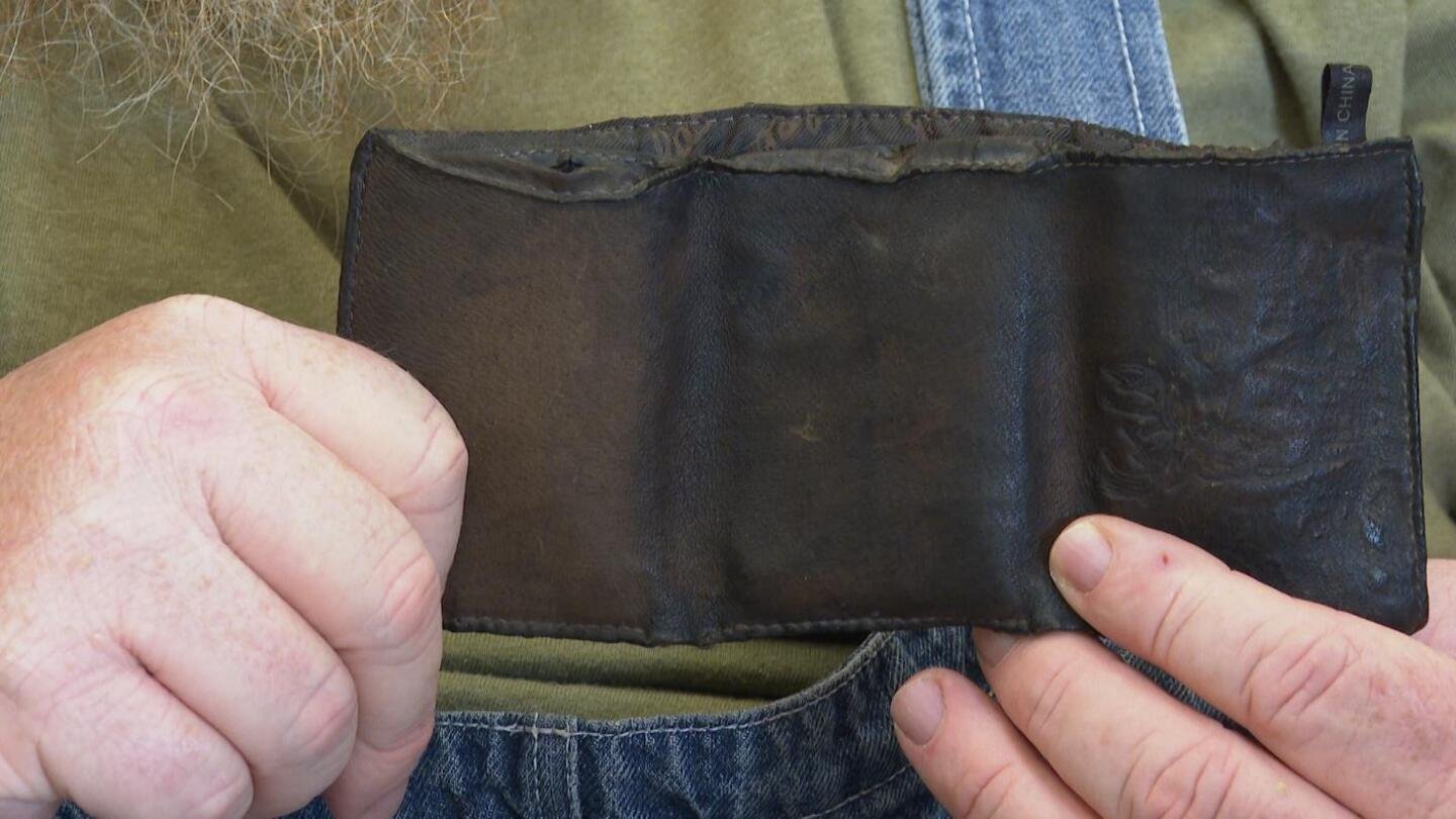 a-michigan-autoworker’s-wallet-is-found-under-a-hood-in-minnesota-—-151,000-miles-later