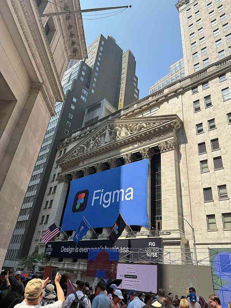 People gather outside of the New York Stock Exchange during the initial public offering of Figma, a design software vendor, in New York, Thursday, July 31, 2025.