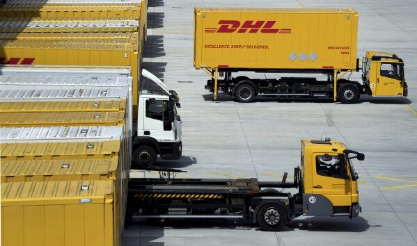 A transfer truck arrives at the DHL Mega Parcel Center in Ludwigsfelde near Berlin, Germany, May 31, 2022. (AP Photo/Michael Sohn, File)
