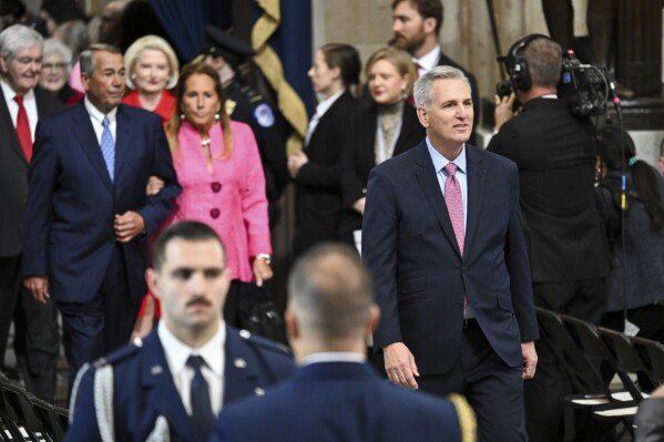 Former Speakers of the House Kevin McCarthy, right, John Boehner, center, and Newt Gingrich, left, arrive before the 60th Presidential Inauguration in the Rotunda of the U.S. Capitol in Washington, Jan. 20, 2025.(Saul Loeb/Pool photo via AP, File)