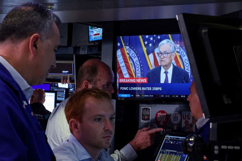 A TV on the floor of the New York Stock Exchange shows Federal Reserve Chair Jerome Powell on Wednesday.