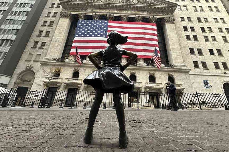 FILE - The Fearless Girl statue stands in front of the New York Stock Exchange in New York's Financial District on Tuesday, Nov. 5, 2024. (AP Photo/Peter Morgan, File)