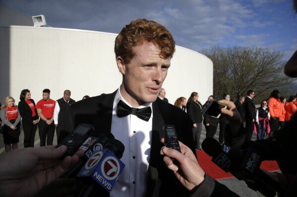Rep. Joseph P. Kennedy III, D-Mass., speaks with members of the media as he arrives at the John F. Kennedy Presidential Library and Museum before the 2017 Profile in Courage award ceremonies, May 7, 2017, in Boston. (AP Photo/Steven Senne, File)