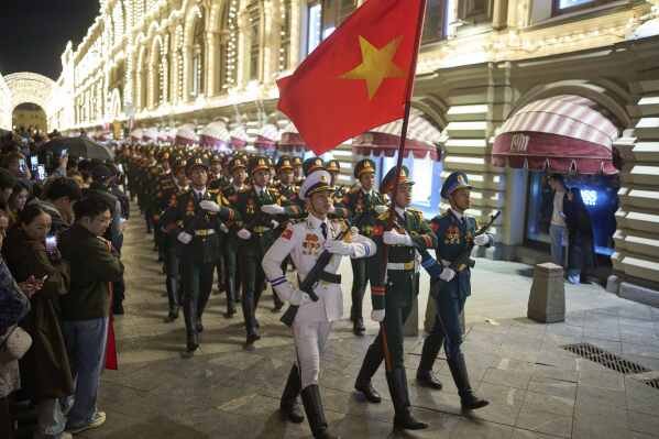 FILE- People's Army of Vietnam soldiers march past the GUM department store toward Red Square to attend a rehearsal for the Victory Day military parade in Moscow, Russia, on Saturday, May 3, 2025. (AP Photo/Alexander Zemlianichenko, File)