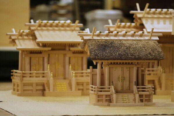Handmade Shinto shrine alters are seen at Miyachu factory, which crafts miniature replicas of the Ise Jingu shrine, in Tamaki, central Japan, Thursday, May 1, 2025. (AP Photo/Hiro Komae)