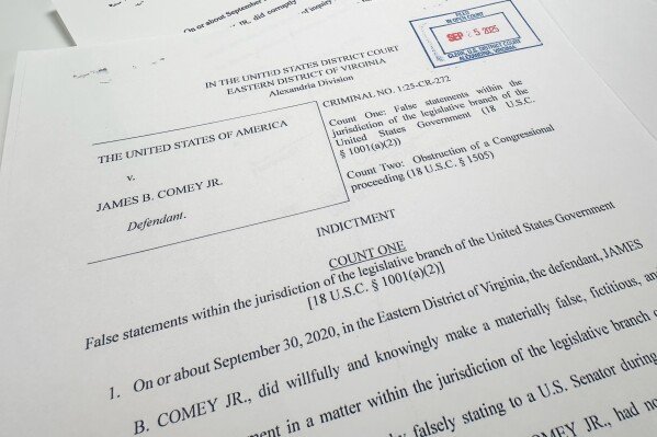 The indictment of former FBI director James Comey is photographed Thursday, Sept. 25, 2025, in Washington. (AP Photo/Jon Elswick)