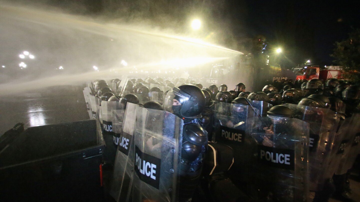 georgia’s-police-use-water-cannons-to-push-back-protesters-trying-to-storm-presidential-palace