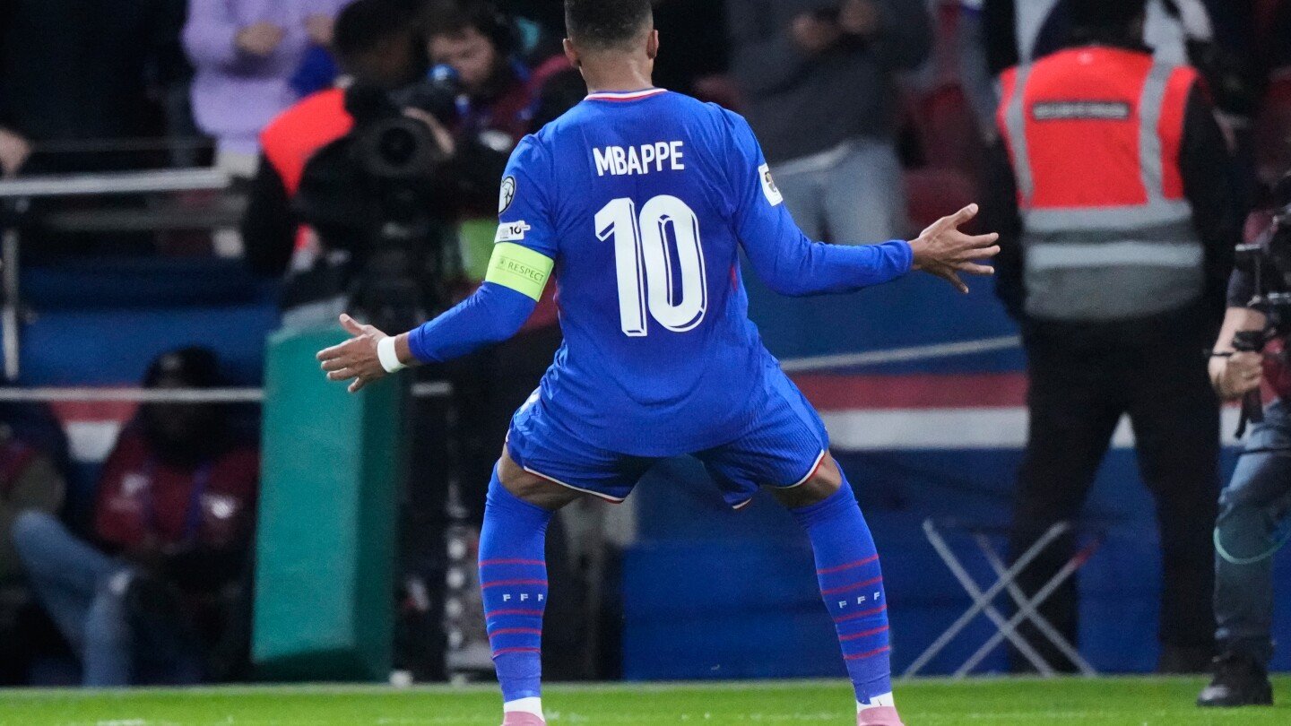 mbappe-scores-but-limps-off-late-in-france’s-world-cup-qualifying-win.-germany-gets-boost