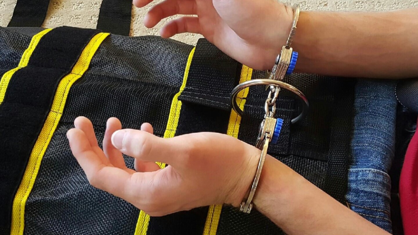 takeaways-from-the-ap-investigation-into-ice’s-use-of-a-full-body-restraint-device-known-as-the-wrap