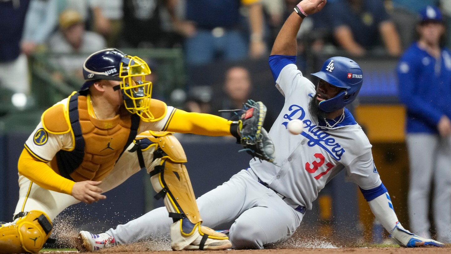 brewers-turn-potential-grand-slam-by-dodgers-slugger-max-muncy-into-wild-double-play-in-nlcs
