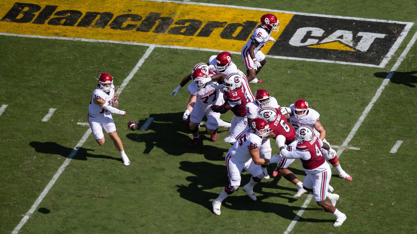 all-about-the-logo:-schools-adding-corporate-gridiron-ads-to-level-revenue-sharing-playing-field