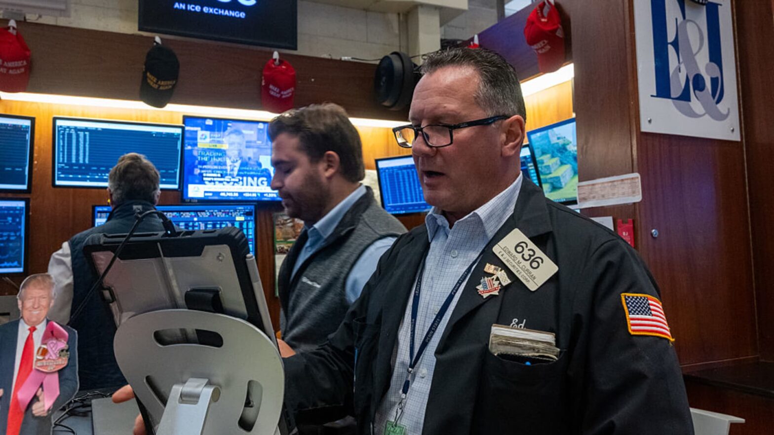 stock-futures-are-little-changed-after-record-session-for-dow;-netflix-slides-on-earnings-miss:-live-updates