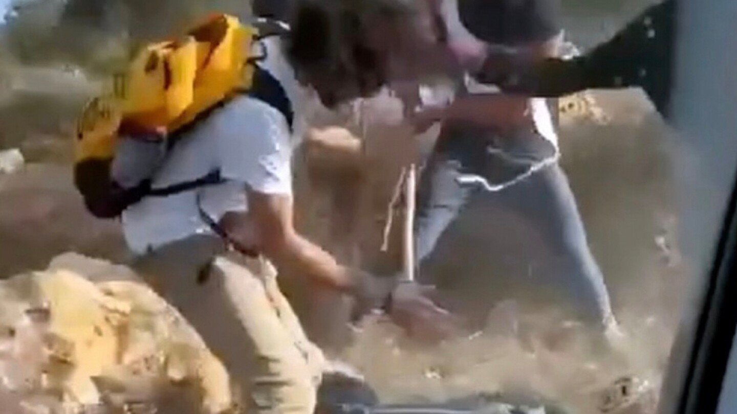 israeli-settlers-beat-palestinian-farmers-on-video-as-attacks-mount-during-west-bank-olive-harvest