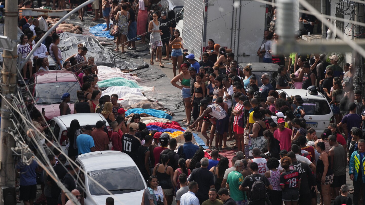 brazilians-in-a-rio-favela-line-up-bodies-after-the-city’s-deadliest-police-raid