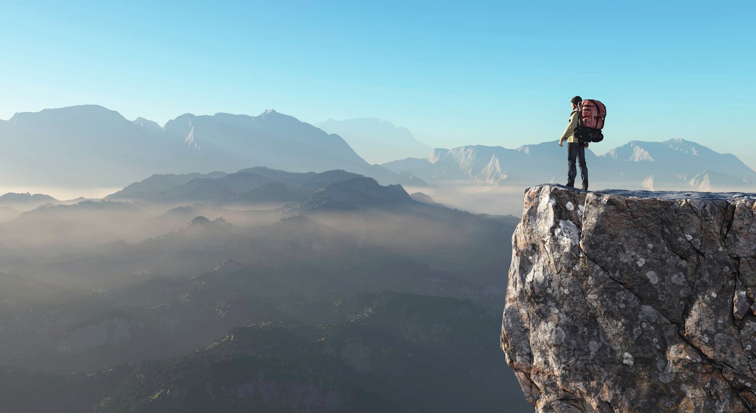 Hiker on top of a mountain.