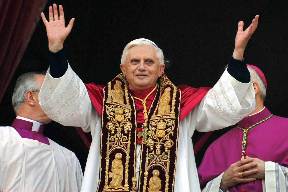 Pope Benedict XVI waving to the crowd.