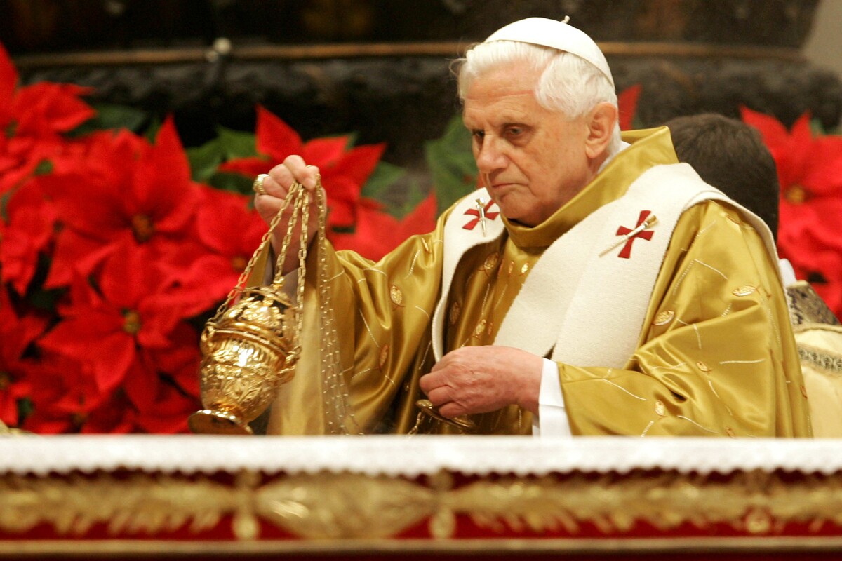 Pope Benedict XVI incenses the altar as he celebrates Midnight Mass in St. Peter's Basilica at the Vatican, Sunday, Dec. 25, 2005.
