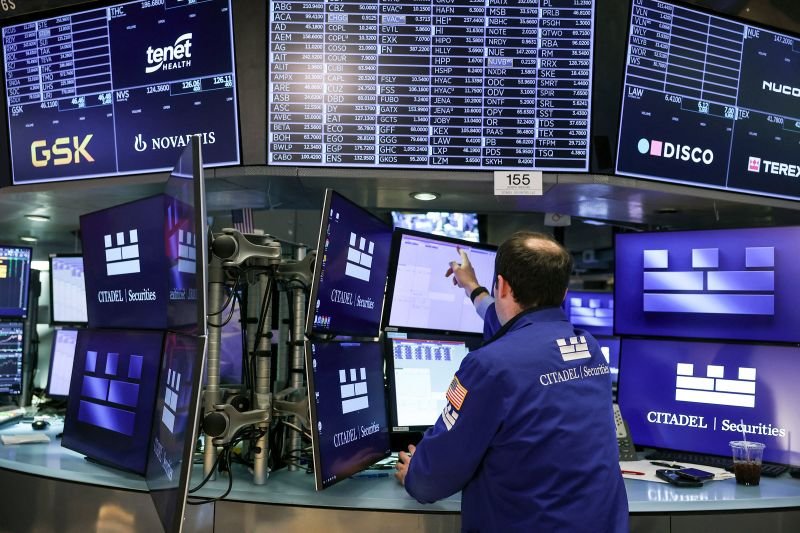 A Trader works on the floor of the New York Stock Exchange on Friday.