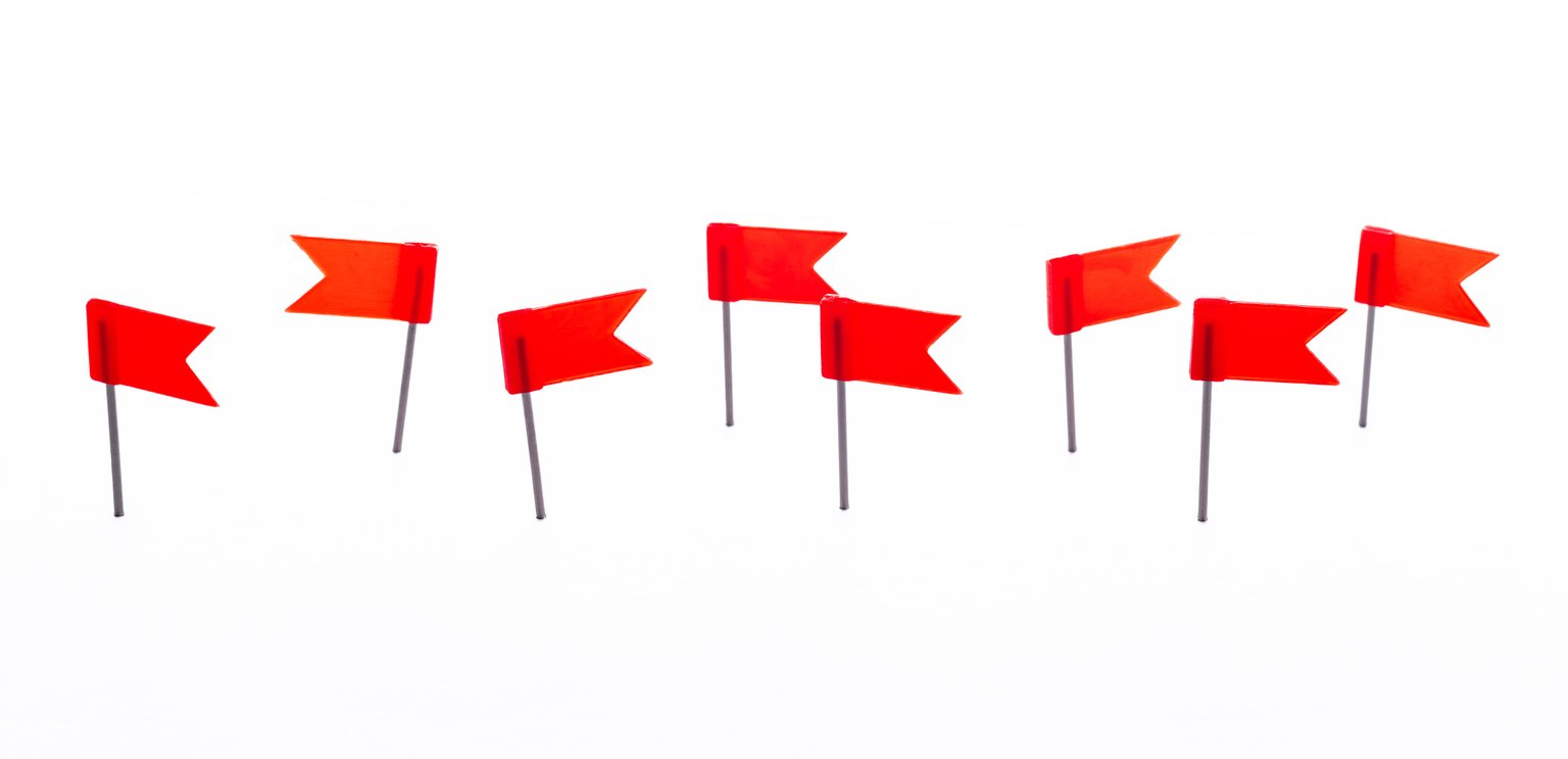 Set of red flags in different position isolated on white background