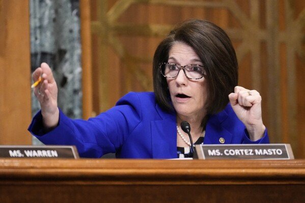 Sen. Catherine Cortez Masto, D-Nev., questions Dr. Mehmet Oz, President Donald Trump's pick to lead the Centers for Medicare and Medicaid Services, at Oz's confirmation hearing before the Senate Finance Committee on Capitol Hill in Washington, March 14, 2025. (AP Photo/Ben Curtis, File)