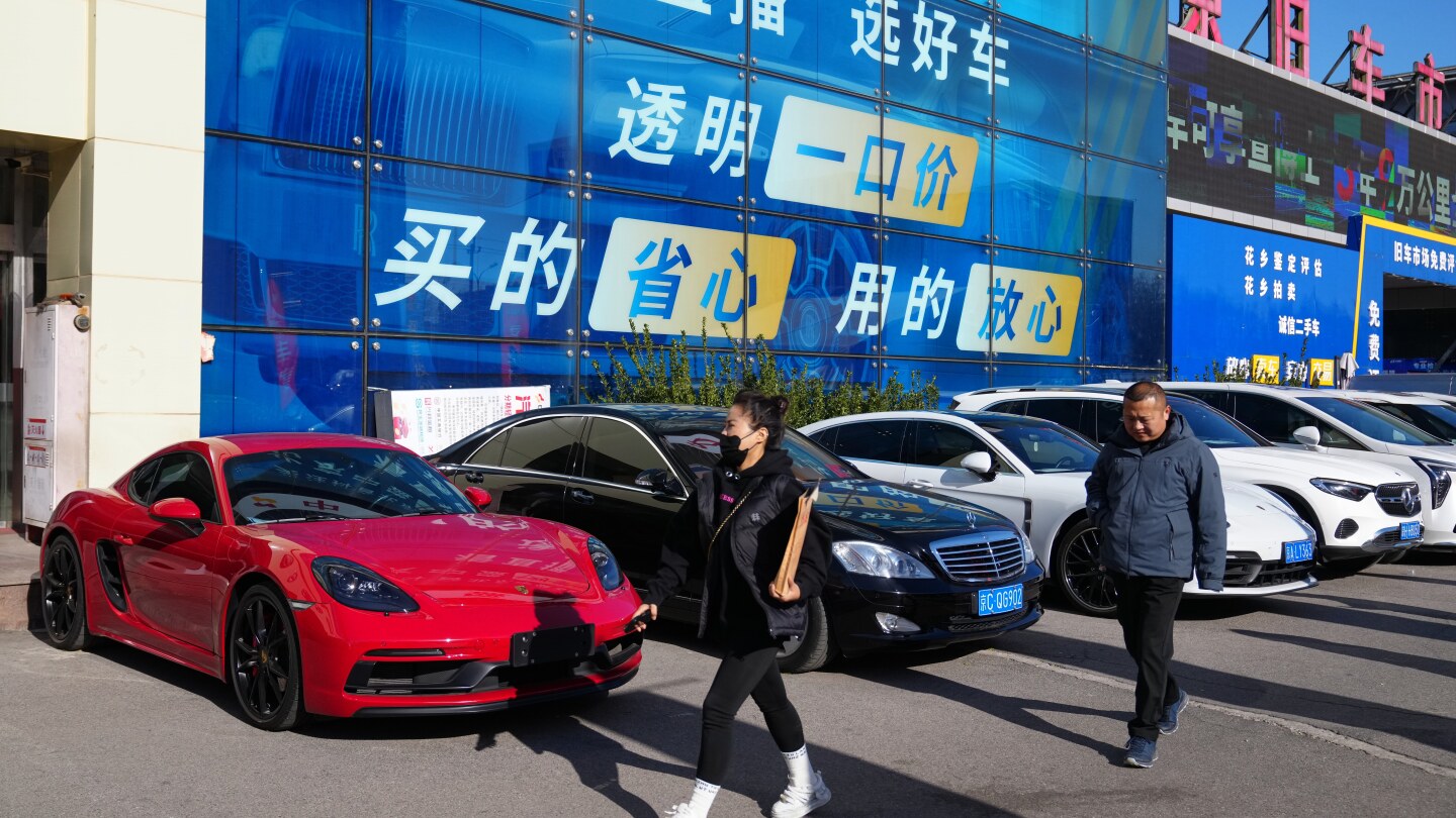 high-end-car-sales-sink-in-china-as-its-economy-slows,-taking-a-toll-on-european-automakers
