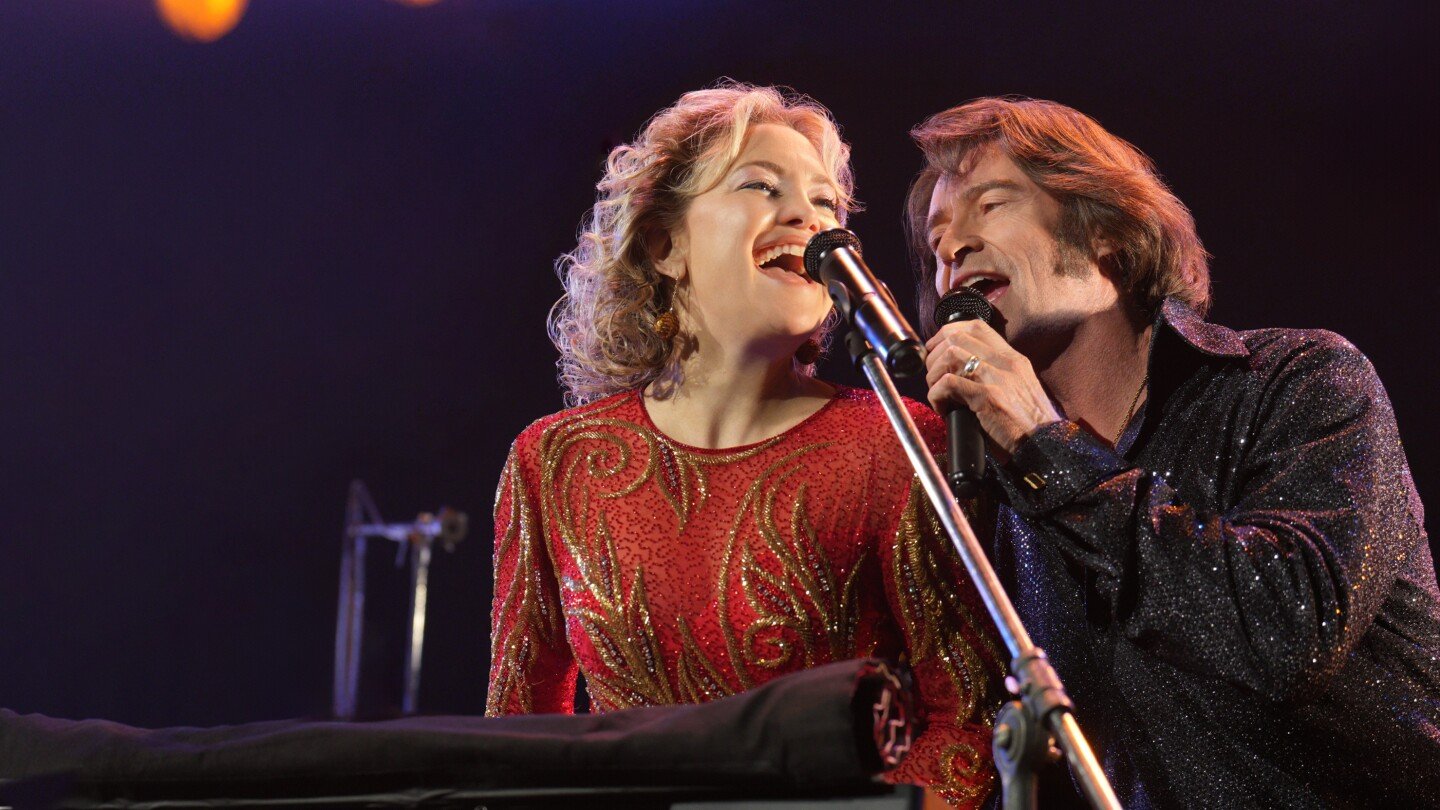 movie-review:-the-neil-diamond-inspired-‘song-sung-blue’-hits-all-the-wrong-notes