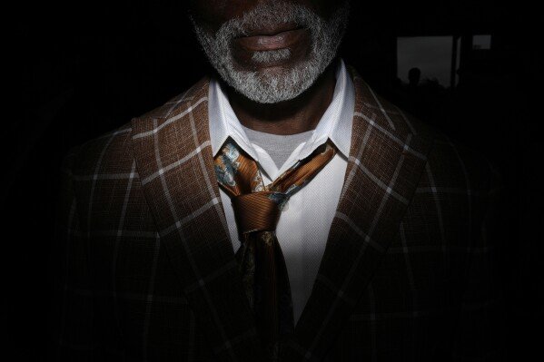 A man walks though Churchill Downs before the Kentucky Derby horse race in Louisville, Ky., May 3, 2025. (AP Photo/Brynn Anderson)