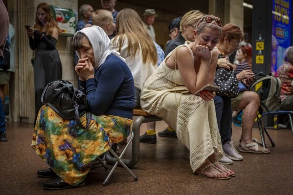People take refuge in a metro station being used as a bomb shelter during a Russian attack in Kyiv, Ukraine, on Sept. 2, 2025. (AP Photo/Dan Bashakov)