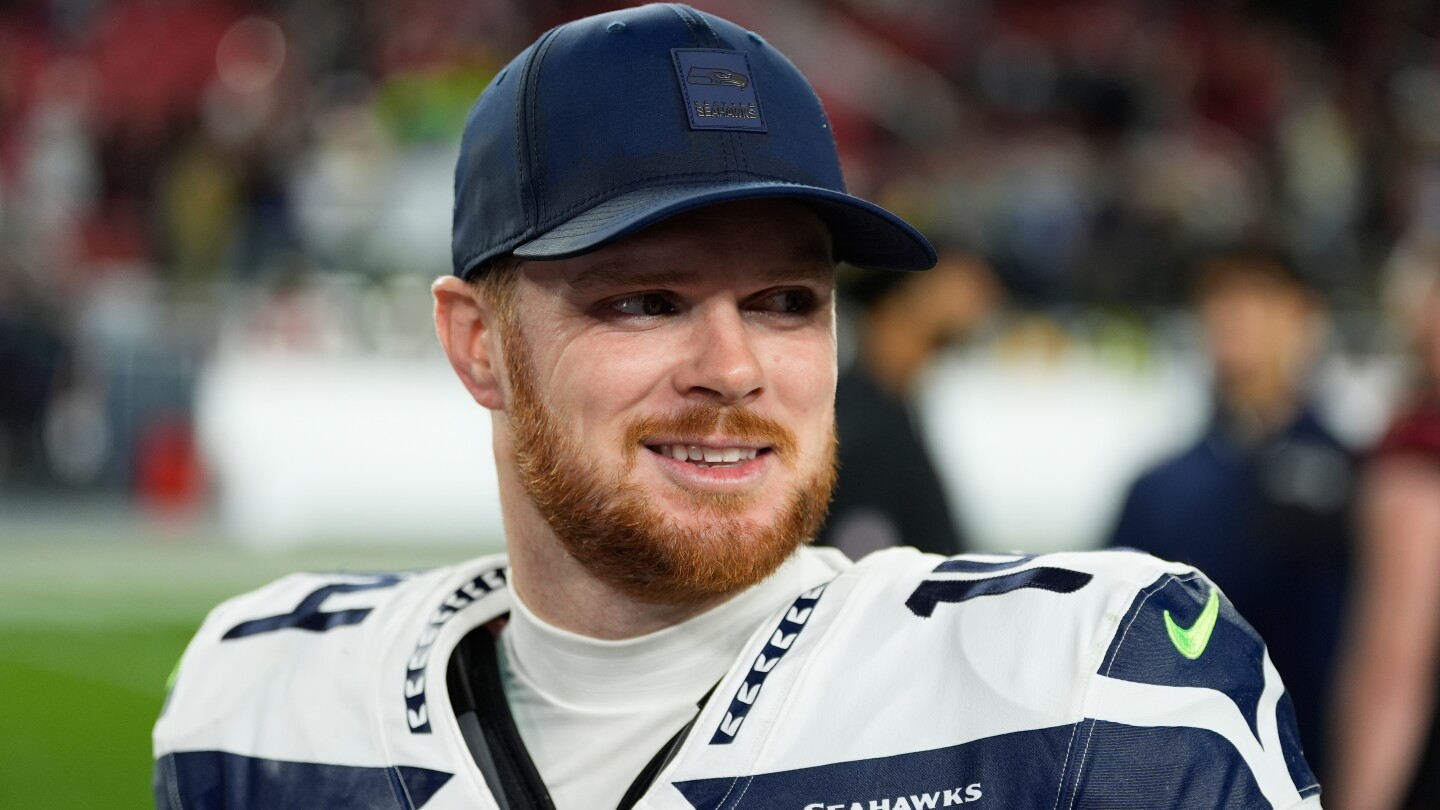 seahawks-qb-sam-darnold-injures-oblique-in-practice-but-is-confident-he’ll-play-vs.-49ers