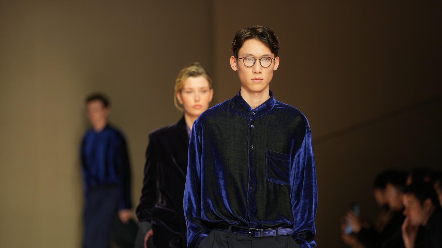 giorgio-armani-launches-new-era-with-iridescent-colors-and-a-star-studded-front-row