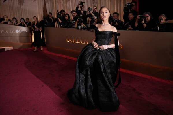Ariana Grande arrives at the 83rd Golden Globes on Sunday, Jan. 11, 2026, at the Beverly Hilton in Beverly Hills, Calif. (Photo by Jordan Strauss/Invision/AP)