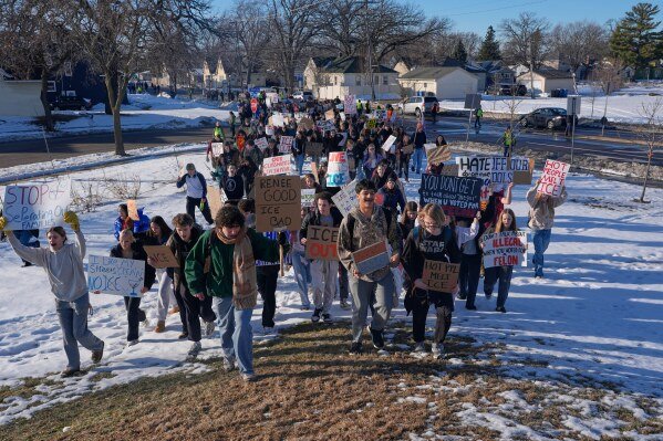 Students from Roosevelt High School protest during a walkout, Monday, Jan. 12, 2026, in Minneapolis. (AP Photo/Jen Golbeck)