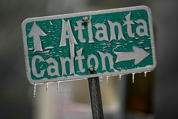 Ice is seen during a winter weather event, Sunday, Jan. 25, 2026, in Kennesaw, Ga. (AP Photo/Mike Stewart)