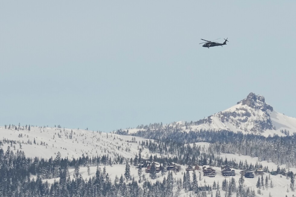 a-helicopter-heads-into-california’s-sierra-nevada-as-crews-battle-brutal-conditions-to-recover-8