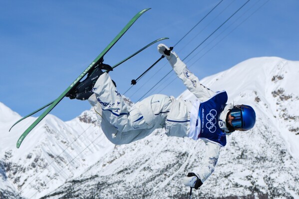 China's Eileen Gu competes during the women's freestyle skiing halfpipe final at the 2026 Winter Olympics, in Livigno, Italy, Sunday, Feb. 22, 2026. (AP Photo/Julia Demaree Nikhinson)