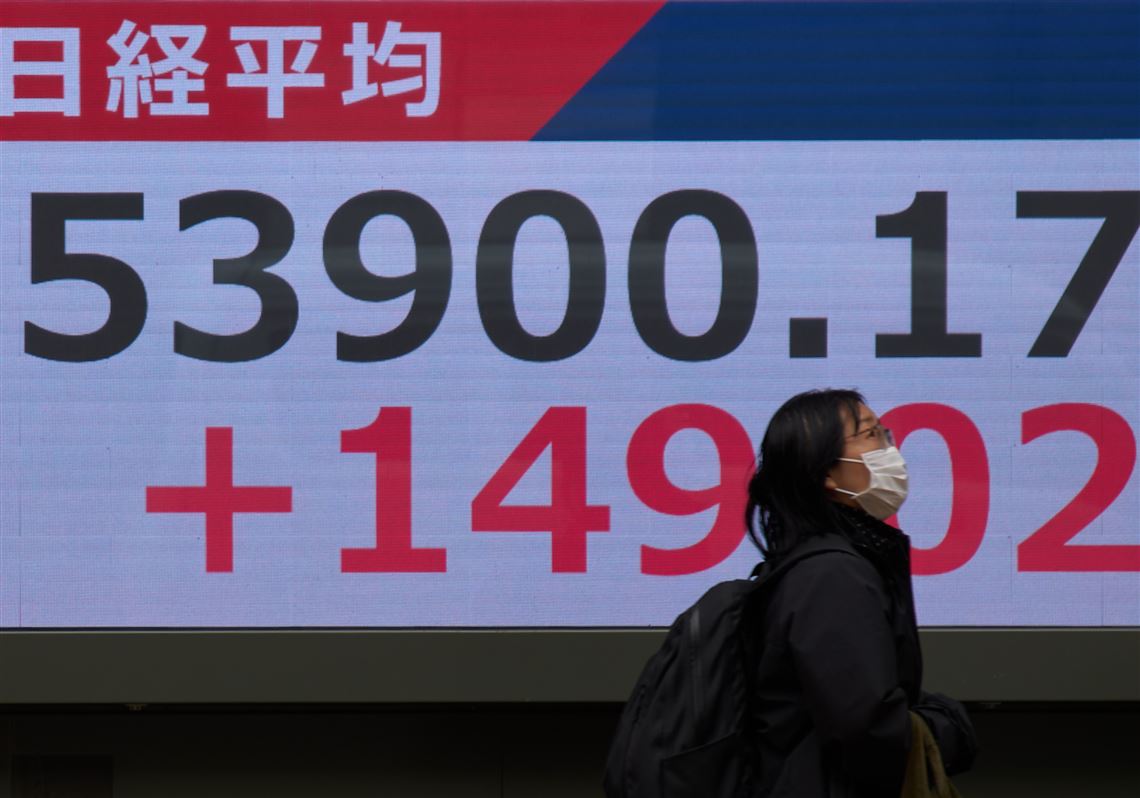 asian-shares-are-mixed-and-us.-futures-slip-as-brent-hovers-above-$100-a-barrel