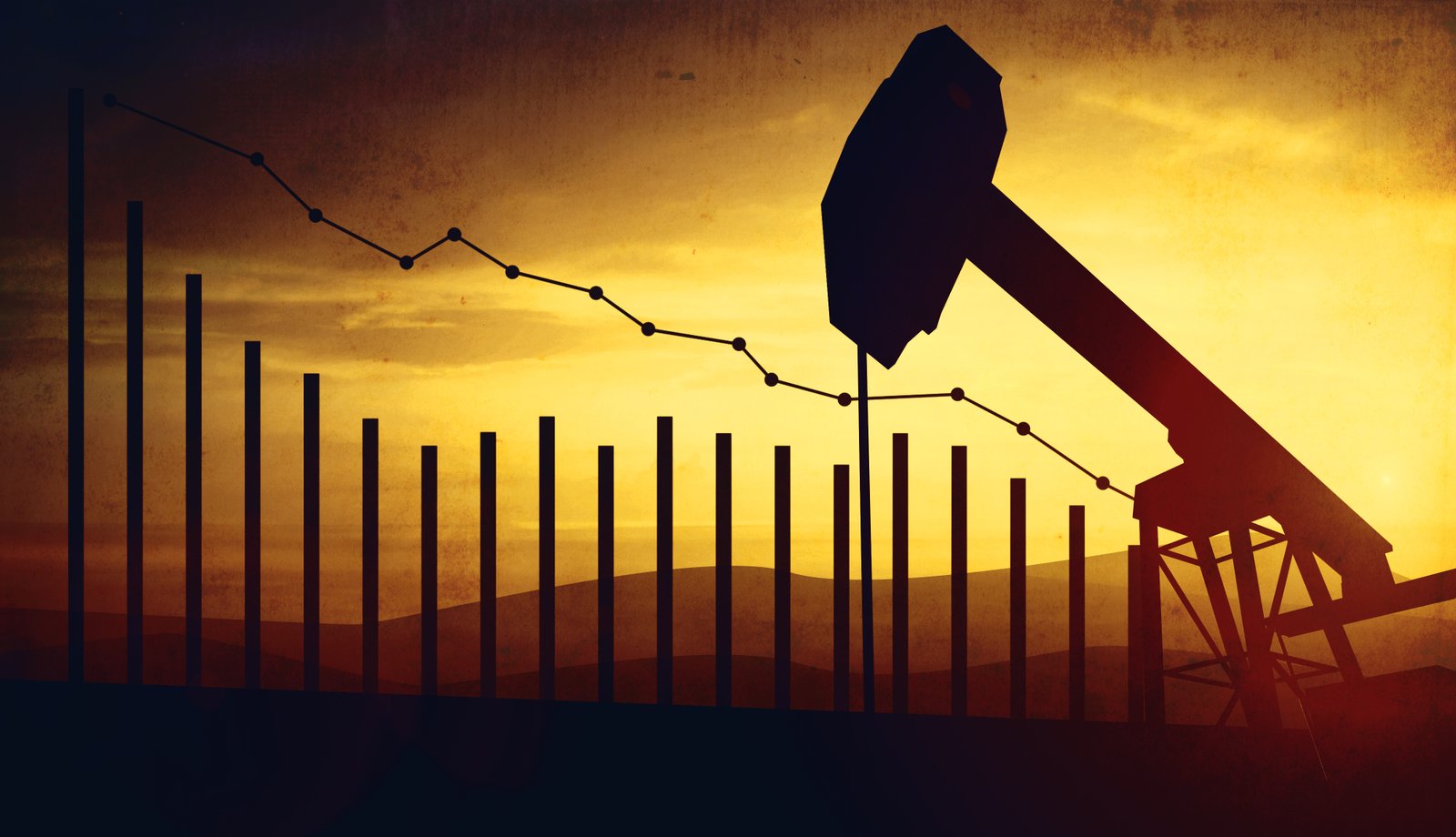 oil pump jacks on sunset sky background