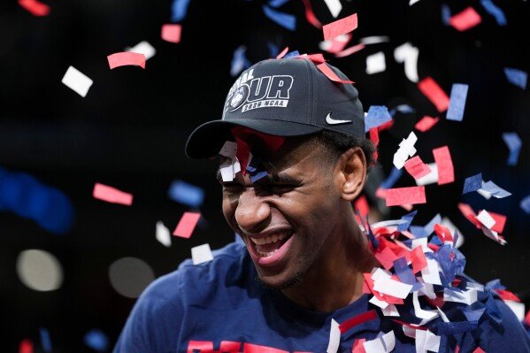 UConn forward Tarris Reed Jr. celebrates after the second half in the Elite Eight of the NCAA college basketball tournament against Duke, Sunday, March 29, 2026, in Washington. (AP Photo/Abbie Parr)