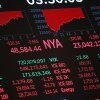 Stock market numbers are displayed on the floor of the New York Stock Exchange.