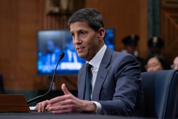 Kevin Warsh testifies during his nomination hearing to be a member and chairman of the Federal Reserve Board of Governors before the Senate Banking, Housing and Urban Affairs Committee on Capitol Hill, in Washington Tuesday, April 21, 2026. (AP Photo/Jose Luis Magana)