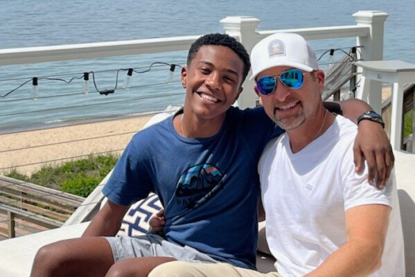 This photo shows Biruk Silvers with his adoptive father, Joshua, in Michigan in 2022. (via AP) 