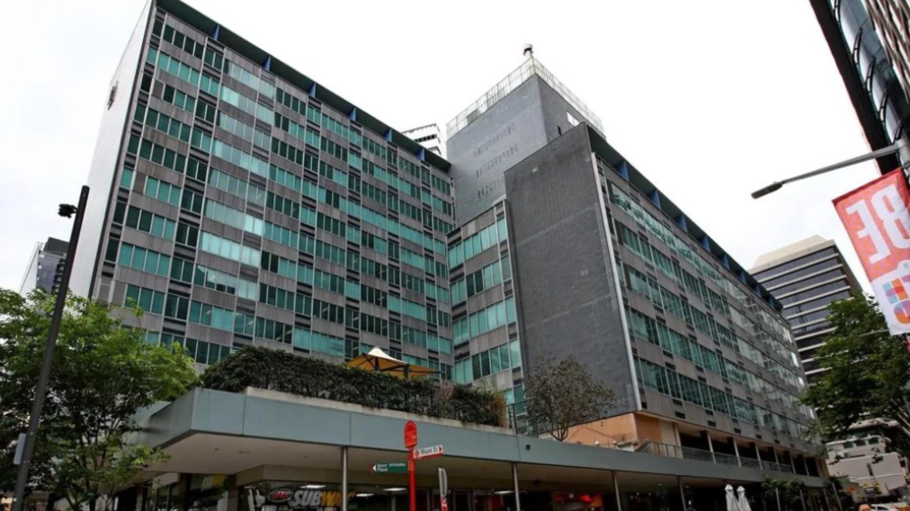 The MLC building is heritage listed as a shining example of corporate modernism — astyle that bravely answered the question, “What if a filing cabinet became an oPicetower?”