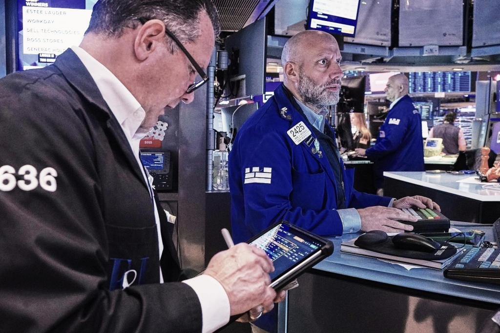 wall-street-hangs-near-its-records-as-oil-prices-ease
