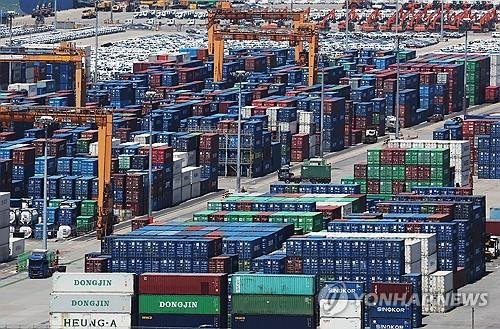 Containers are stacked at a port in Pyeongtaek, around 60 kilometers south of Seoul, in this file photo taken May 8, 2026. (Yonhap)