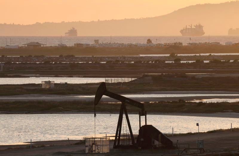 A pumpjack stands idle in the Huntington Beach oil field on April 23, in Huntington Beach, California. Investing in commodities can serve as a hedge against inflation.