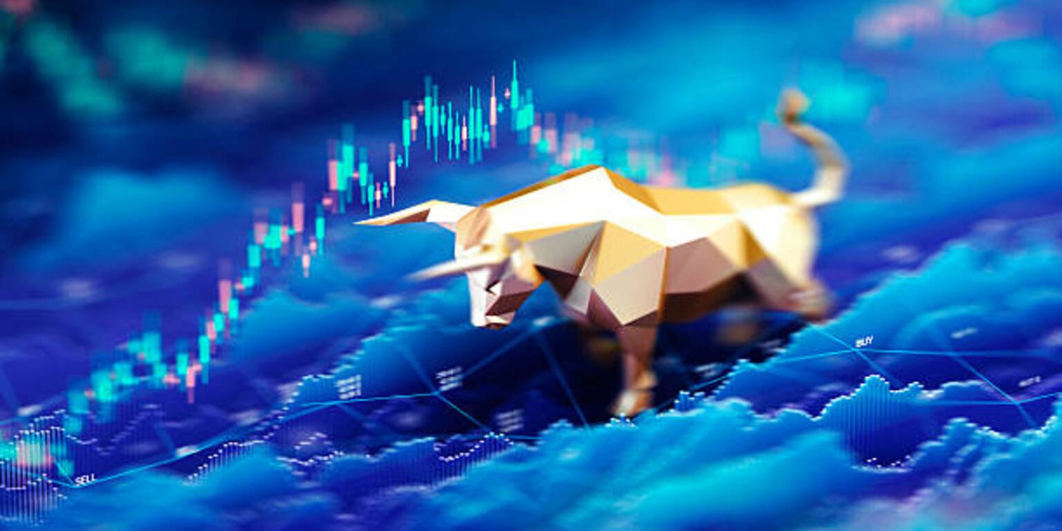 Bull Market Concept with Digital Stock Chart and Golden Bull Figurine