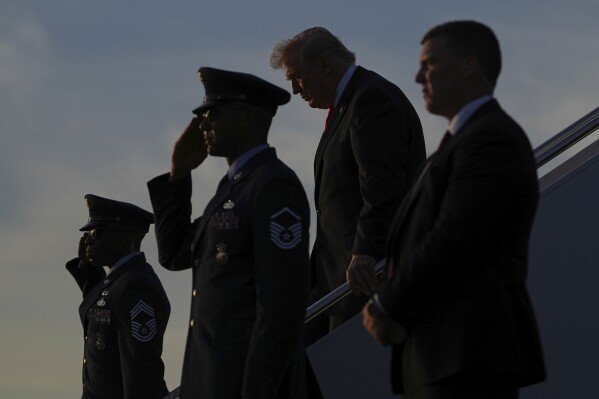 President Donald Trump arrives on Air Force One at Palm Beach International Airport in West Palm Beach Fla., Friday, May 1, 2026. (AP Photo/Matt Rourke)