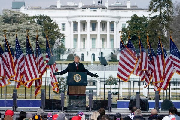 With the White House in the background, President Donald Trump speaks at a rally on Jan. 6, 2021, in Washington. (AP Photo/Jacquelyn Martin, File)