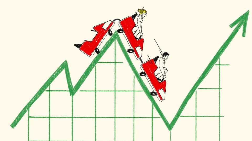 A dark-haired man and a blonde woman in a red rollercoaster ride in which the track is a climbing green stock market arrow with a grid below it