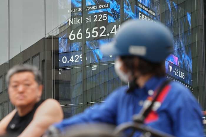 tokyo’s-nikkei-225-index-tops-68,000-for-the-1st-time-as-wall-street-logs-more-records